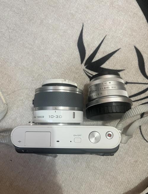 尼康j1和尼康L820哪个好点,性价比高?有什么值得注意的