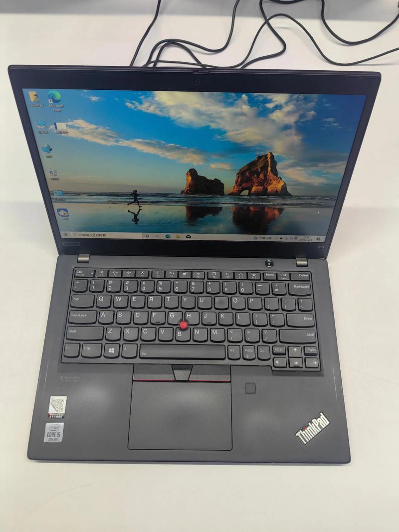 thinkpad笔记本电脑是哪国的品牌,中文名称叫什么?怎么读?请指教...