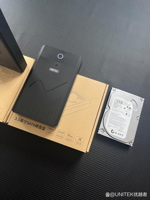 WD西部数据移动硬盘想换硬盘盒怎么拆开没看见螺丝啊你的WD移动硬盘拆开...